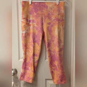Athleta Salutation Stash Pocket Leggings Textured Capri Orange Pink Print